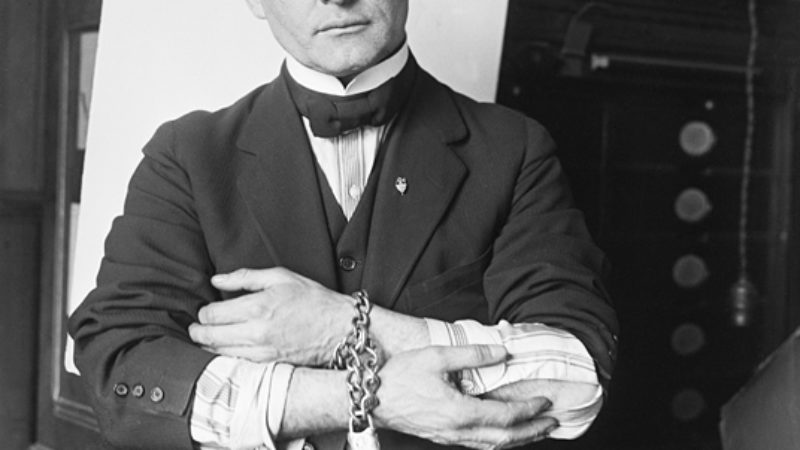 Original Caption: 2/27/1918-Houdini showing how to slip handcuffs.